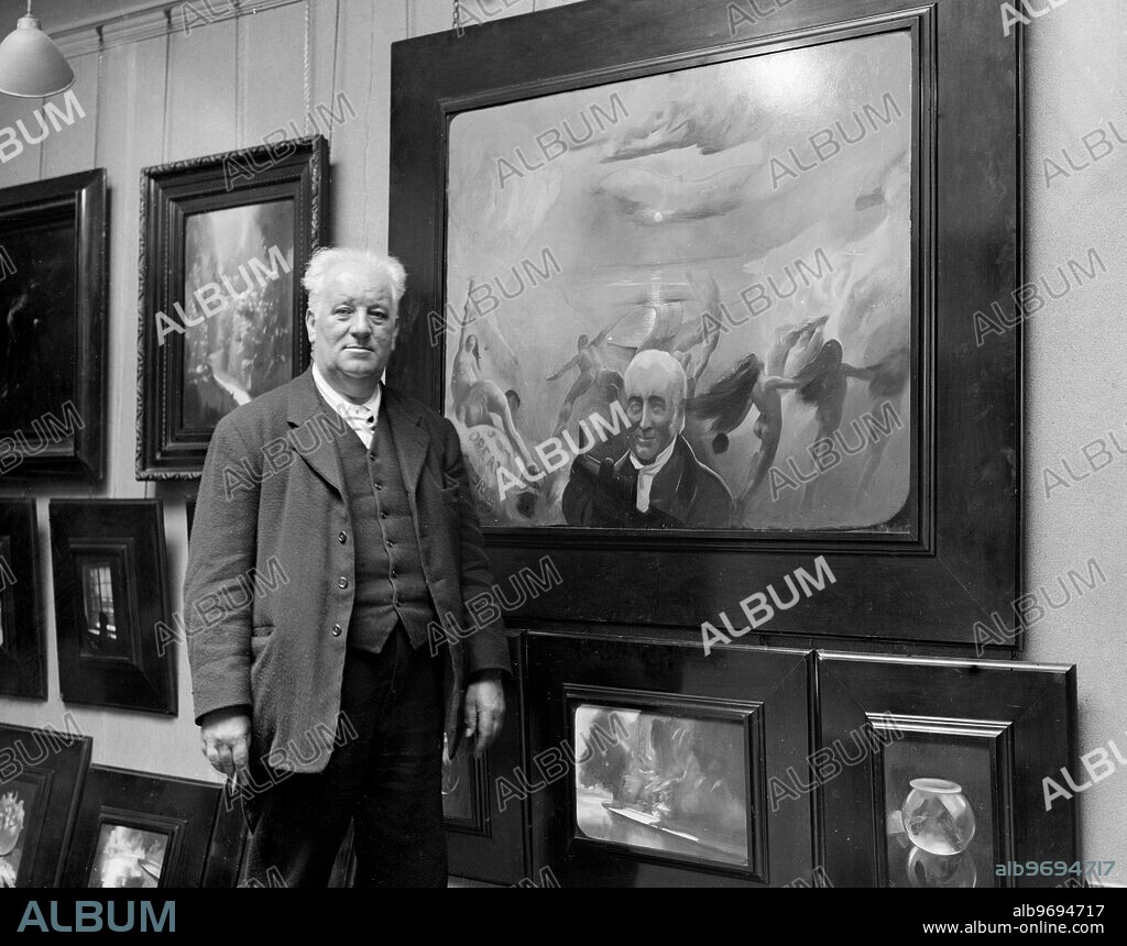 Mr Edgar Herbert Thomas (of Cardiff) at the Exhibition of his new thought painting at the Brook Street Art Galleries. 25 June 1928. © TopFoto.