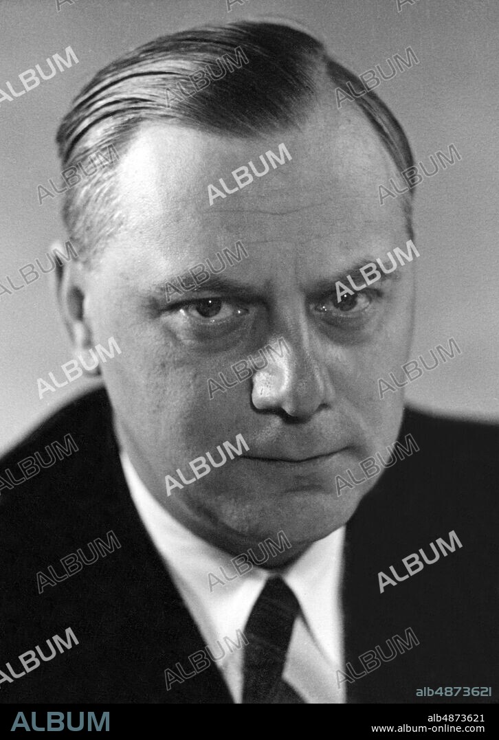GERMANY 1937-12-29. Orig. caption ... ON THE 45TH BIRTHDAY OF ALREAD ROSENBERG. On January 12, Reichsleider Alfred Rosenberg celebrates his 45th birthday. Photo: Heinrich Hoffmann / AB Text & Bilder / SVT / Code: 5600 Folder: Rosenberg, Alfred A Rosenberg, 1893-1946, German Nazi ideologue and politician. persons: ALFRED ROSENBERG sites: GERMANY.