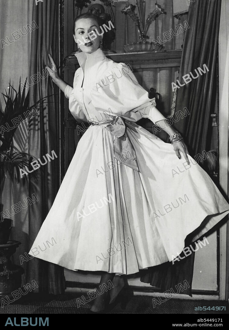 Above right: Michele Safargy models a Mitchell-designed dress in beige cotton shirting with a lime green taffeta sash. Enormous leg-of-mutton sleeves and a stitched up-standing collar are some of the season's new fashion pointers. July 1, 1952.