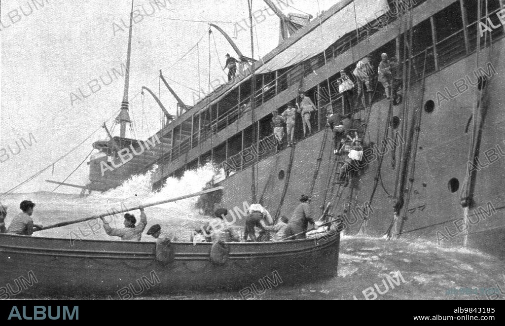 'At Sea; After the "Sontay" was torpedoed on April 16, 1917, at noon: the last passengers board into lifeboats. The "Sontay" was going from Marseille to Salonika. Torpedoed in heavy seas, she sank in 5 minutes. Nevertheless out of 425 people on board, 380 could be saved. Its commander, the heroic lieutenant Jean-Baptiste Mages, did not want to survive those who had perished. He let himself sink with his ship. Standing on the bridge, when the sea reached him, he raised his cap and shouted: "Vive la France!"; then he disappeared', 1917. From "L'Album de la Guerre 1914-1919, Volume 2" [L'Illustration, Paris, 1924].