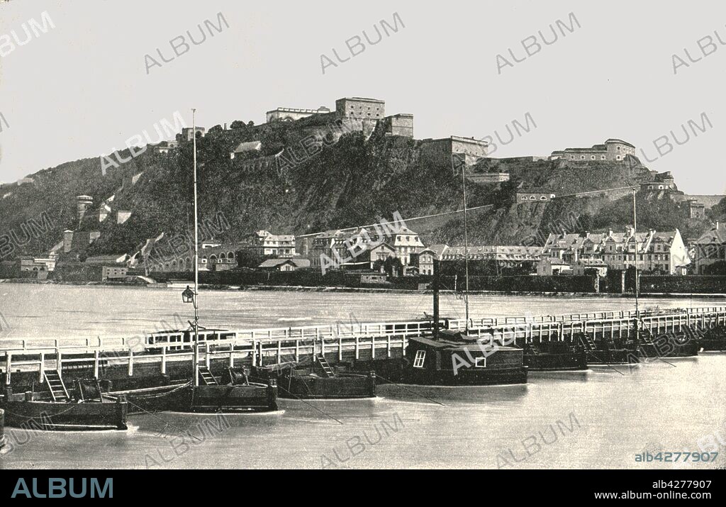 FRANCIS FRITH & CO. The Fortress of Ehrenbreitstein on the Rhine, Germany, 1895. Ehrenbreitstein Fortress, built in the 19th century, with pontoon bridge in the foreground. From "Round the World in Pictures and Photographs: From London Bridge to Charing Cross via Yokohama and Chicago". [George Newnes Ltd, London, 1895].