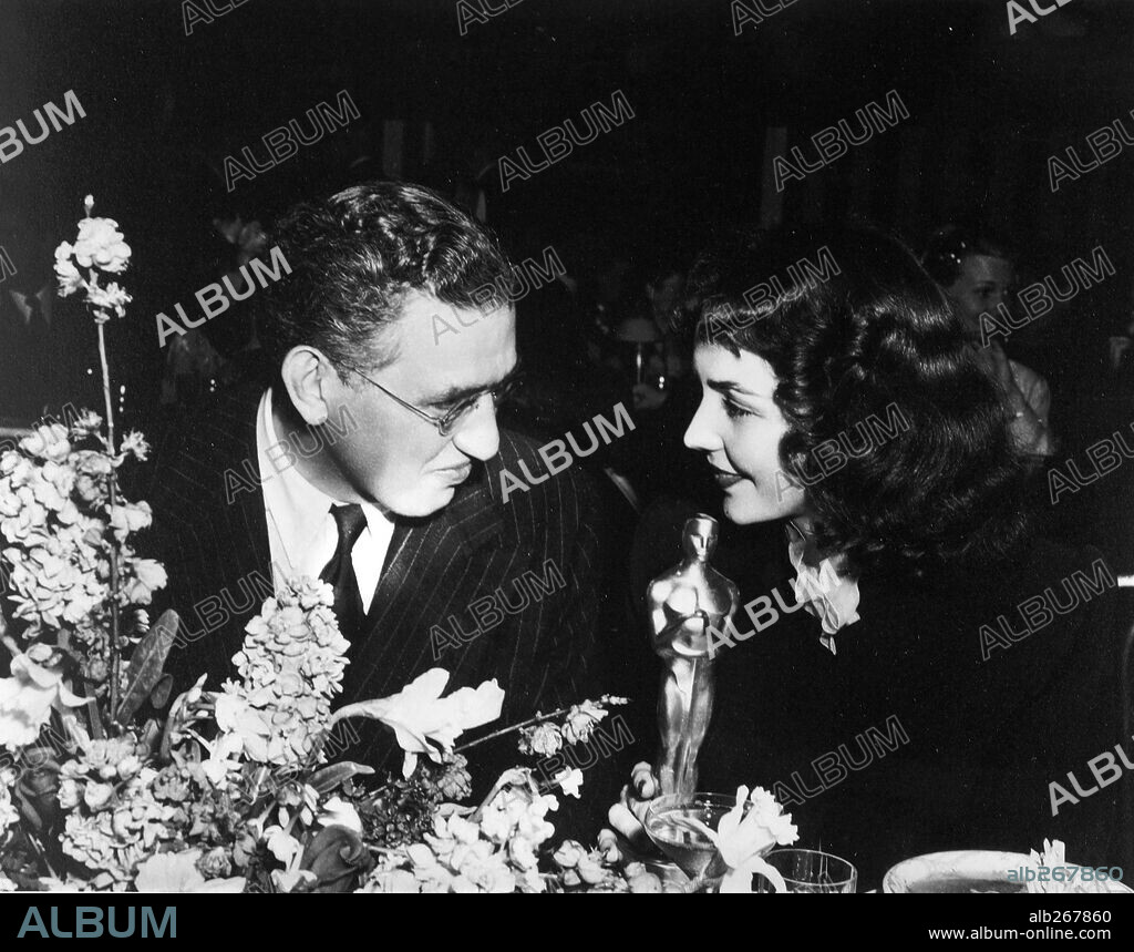 DAVID O. SELZNICK and JENNIFER JONES. 16th Academy Awards (1944). David O. Selznick with Jennifer Jones, winner of the best actress award fot "The Song of Bernadette". 1944