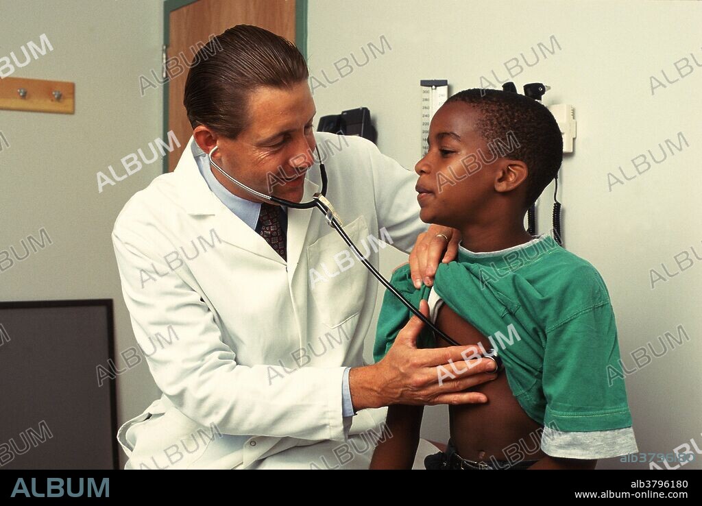Pediatric examination. A doctor uses a stethoscope to listen to a child's chest. Pediatric Clinic Methodist Hospital. Brooklyn, N.Y.