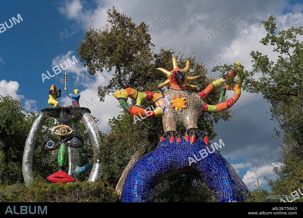 NIKI DE SAINT-PHALLE y JEAN TINGUELY. Colorful sculptures in Giardino dei Tarocchi or Garden of the Tarot, by Niki de Saint Phalle and Jean Tinguely, in Capalbio, Province of Grosseto, Tuscany, Italy, Europe.