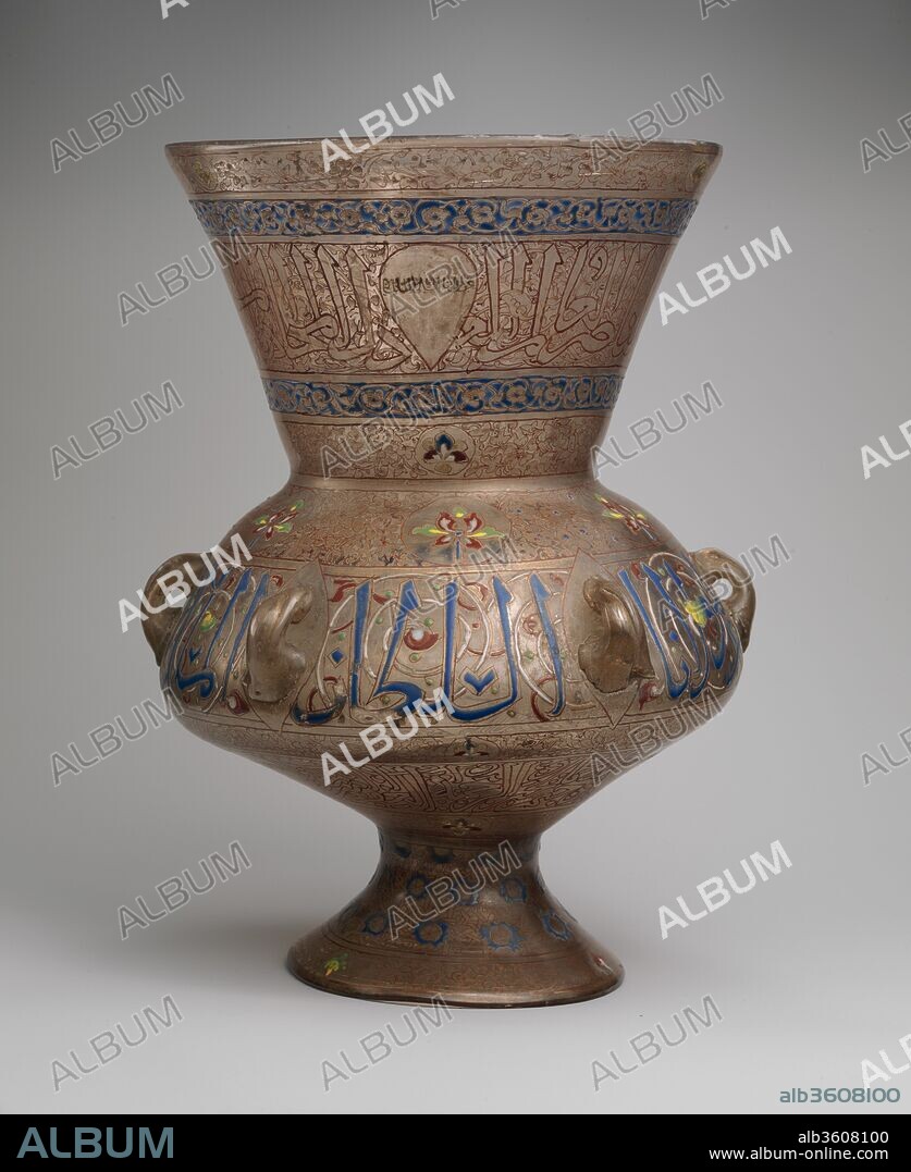 Mosque Lamp Bearing the Name of the Mamluk Sultan al-Malik al-Nasir. Dimensions: H. 13 in. (33 cm)
Diam. of rim 8 5/8 in. (21.9 cm). Date: ca. 1340.