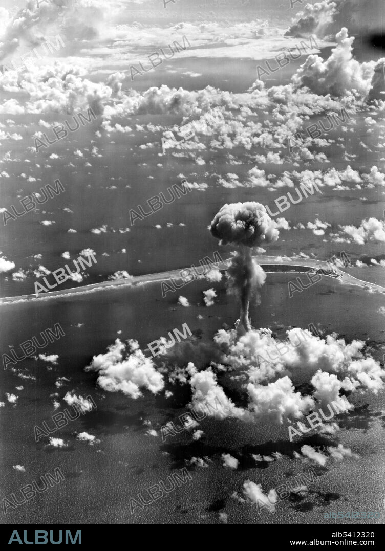 Crossroads Able, a 23-kiloton air-deployed nuclear weapon detonated on July 1, 1946. This bomb used, and consumed, the infamous Demon core that took the lives of two scientists in two separate criticality accidents. Operation Crossroads was a series of nuclear weapon tests conducted by the US at Bikini Atoll investigating the effect of nuclear weapons on naval ships. Photographed by USAF.
