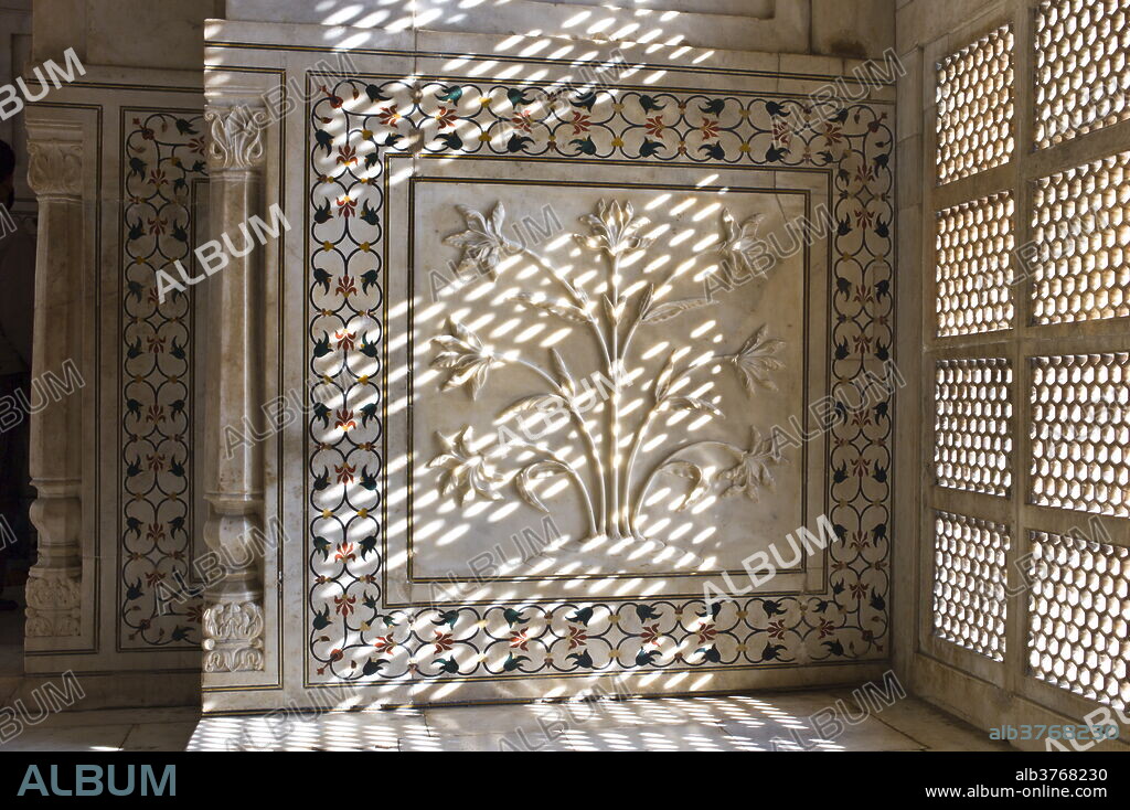 The Taj Mahal mausoleum interior by tombs of Shah Jahan and Mumtaz Mahal , Uttar Pradesh, India.