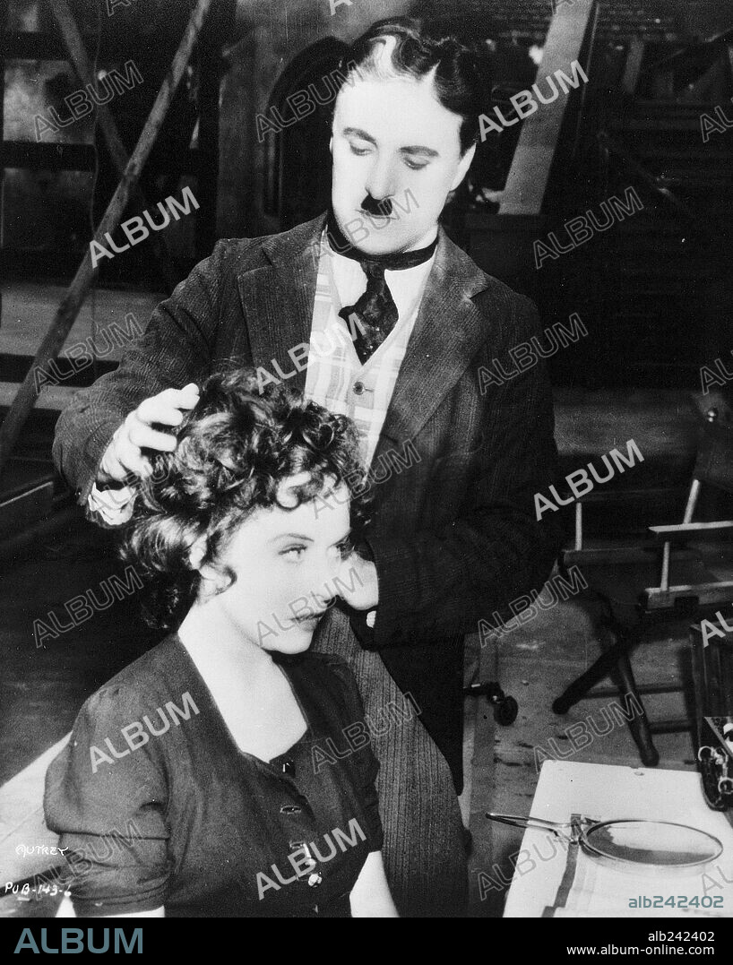 CHARLIE CHAPLIN y PAULETTE GODDARD en EL GRAN DICTADOR, 1940 (THE GREAT DICTATOR), dirigida por CHARLES CHAPLIN. Copyright UNITED ARTISTS.