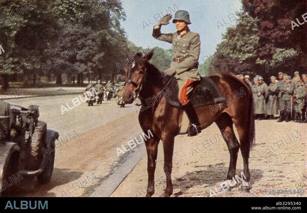 Lieutenant General Kurt von Briesen salutes his troops during the parade in Paris on the 14th of June 1940.