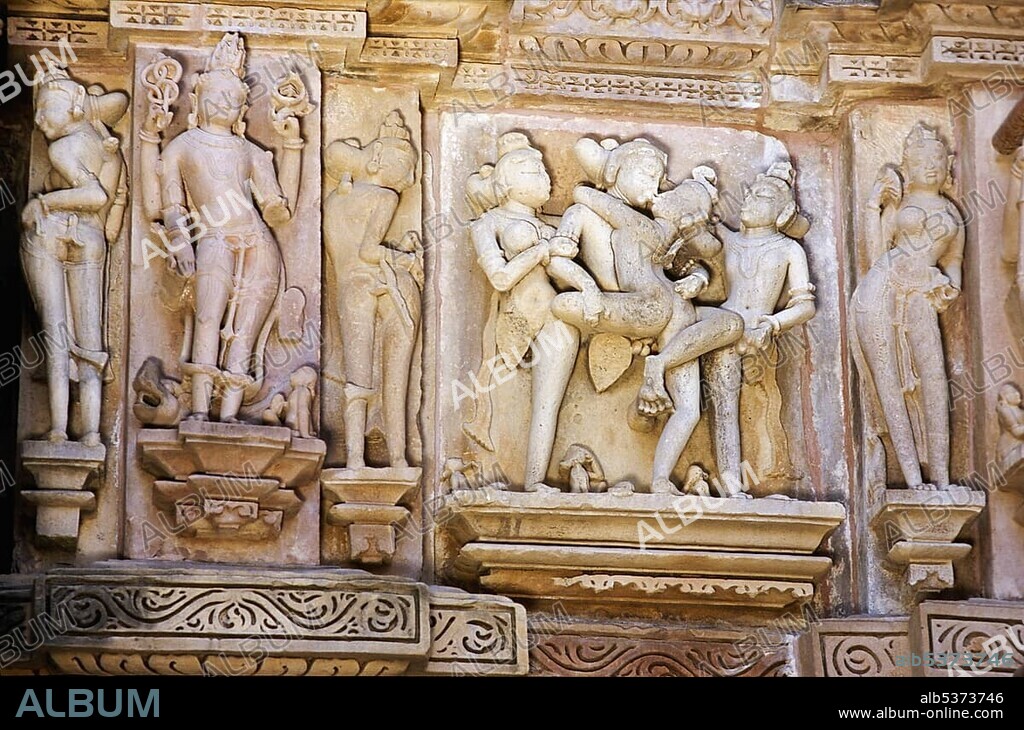 Stone carvings depicting scenes from the Kamasutra, Khajuraho temples, Khajuraho, Madhya Pradesh, India, Asia