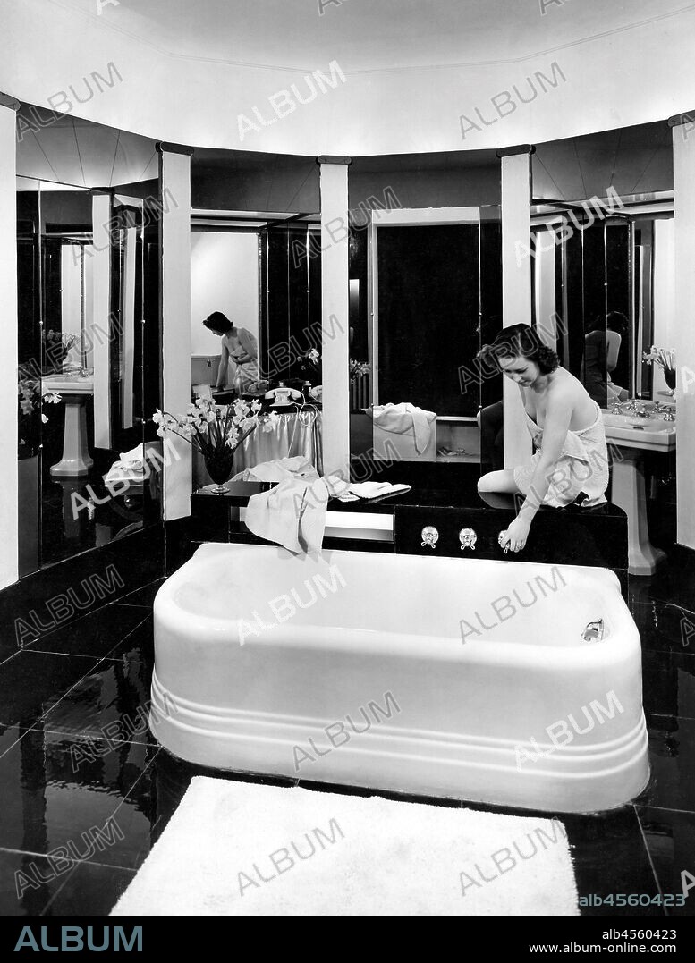 Woman in bathroom. 1930.