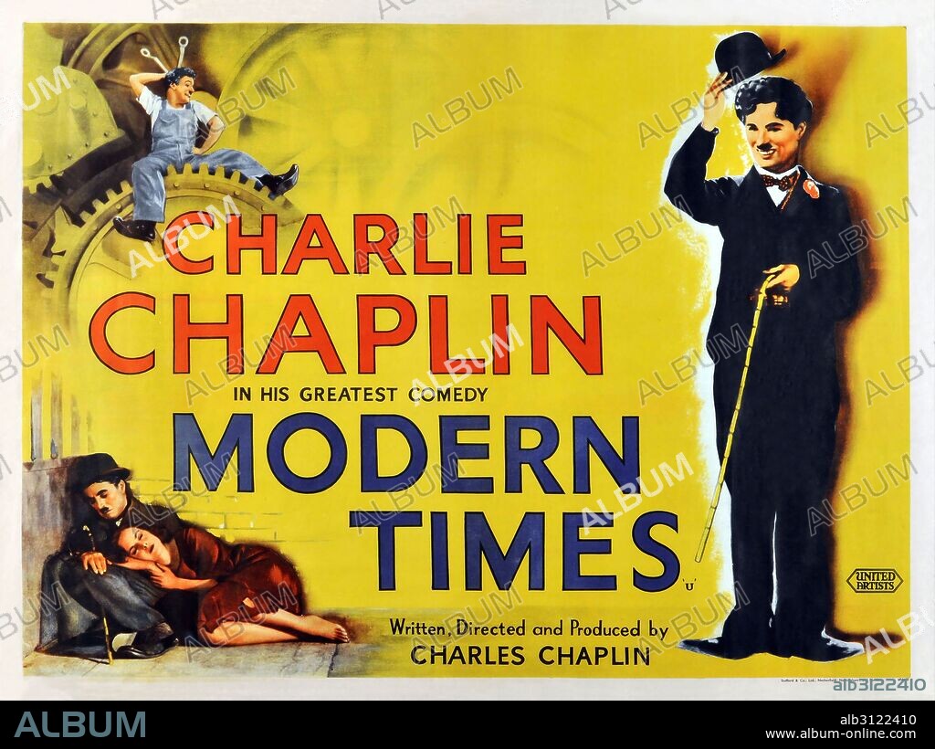 CHARLIE CHAPLIN en TIEMPOS MODERNOS (MODERN TIMES, 1936), dirigida por CHARLES CHAPLIN. Copyright CHAPLIN/UNITED ARTISTS.