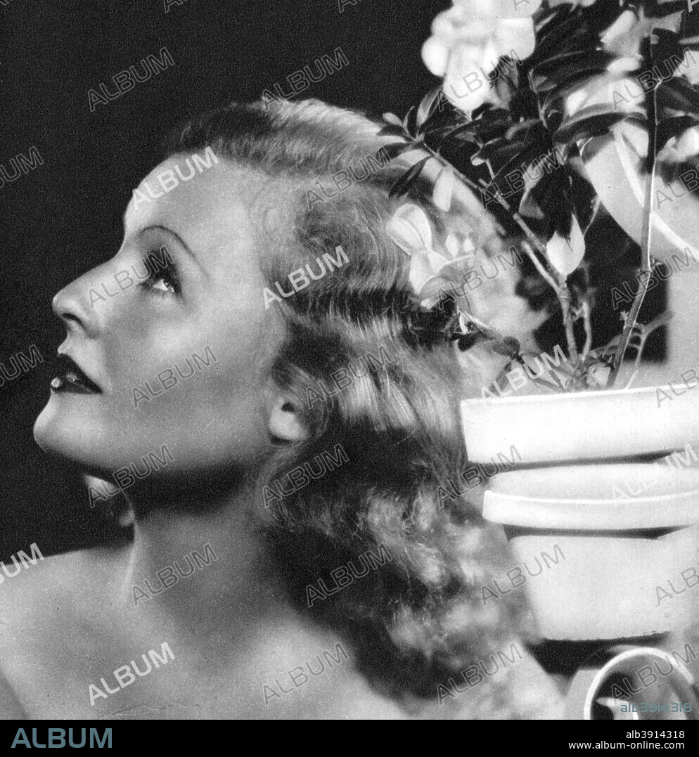 Lilian Harvey, British born German actress and singer, 1934-1935. Lilian Harvey  starred in many silent films made in Germany in the 1920s and early 1930s. Her training as a singer enabled her to continue with her career into the talking picture era. Taken from Meet the Film Stars, by Seton Margrave. (London, 1934-1935).