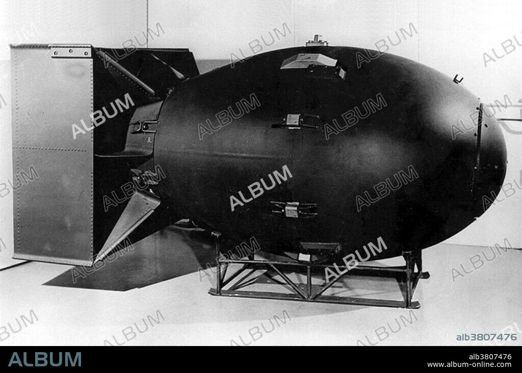 Photograph of a mock-up of the Fat Man nuclear weapon dropped on Hiroshima, Japan, in August 1945. This was the first photograph of the Fat Man bomb casing to ever be released by the U.S. government (it was declassified in 1960). "Fat Man" is the codename for the atomic bomb that was detonated over Nagasaki, Japan, by the United States on August 9, 1945. It was the second of two nuclear weapons to be used in warfare to date, and its detonation caused the third man-made nuclear explosion.
