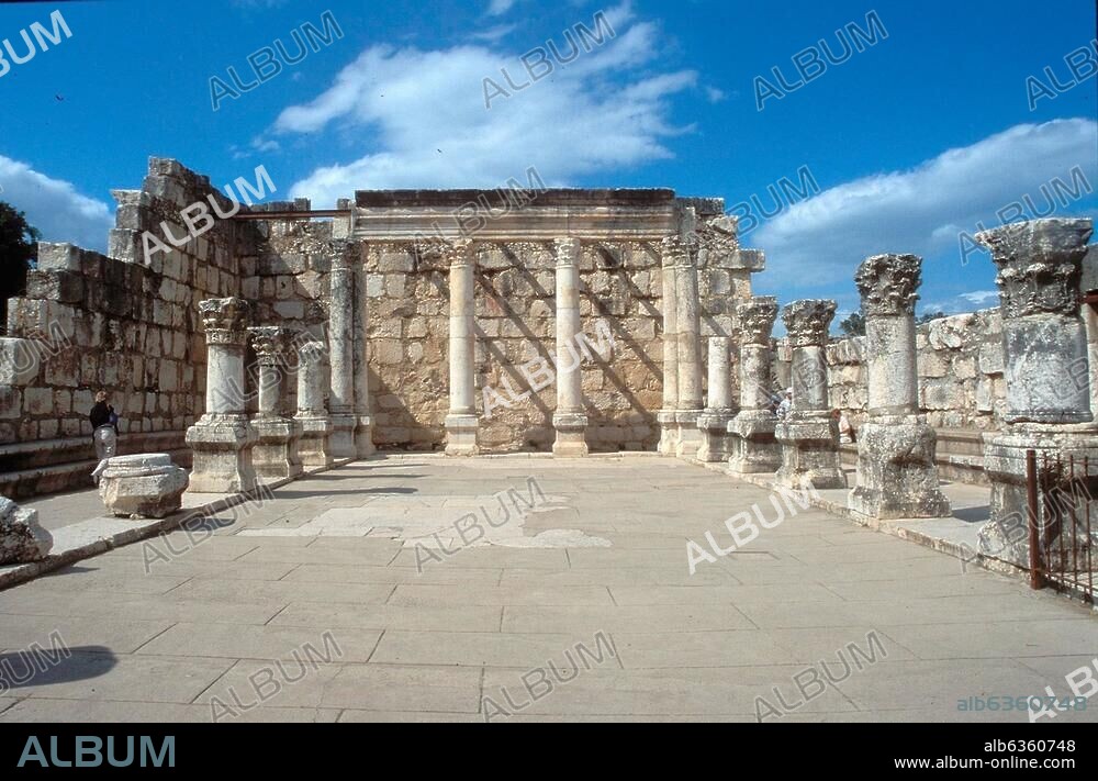 568. CAPERNAUM-REMAINS OF THE SPLENDID SYNAGOGUE NEAR THE SEA OF GALILEE DATING FROM THE 4-5TH C. AD. IT STOOD IN THE CENTREE OF THE VILLAGE MENTIONED MANY TIMES IN THE NEW TESTAMENT IN CONNECTION WITH JESUS' MINISTRY.