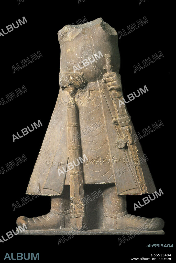 CENTRAL ASIAN ART. Statue of the emperor Kanishka with inscriptions in Brahmi Script.