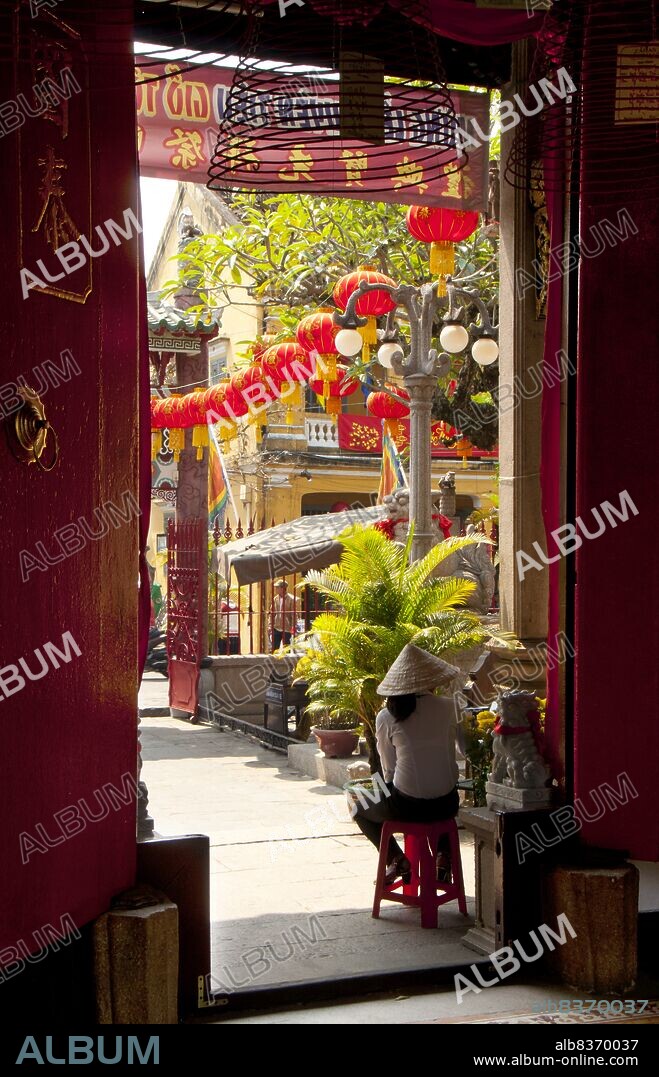 The Assembly Hall of the Cantonese Chinese Congregation (Quang Trieu) was originally built in 1885.<br/><br/>. The small but historic town of Hoi An is located on the Thu Bon River 30km (18 miles) south of Danang. During the time of the Nguyen Lords (1558 - 1777) and even under the first Nguyen Emperors, Hoi An - then known as Faifo - was an important port, visited regularly by shipping from Europe and all over the East.<br/><br/>. By the late 19th Century the silting up of the Thu Bon River and the development of nearby Danang had combined to make Hoi An into a backwater. This obscurity saved the town from serious fighting during the wars with France and the USA, so that at the time of reunification in 1975 it was a forgotten and impoverished fishing port lost in a time warp.