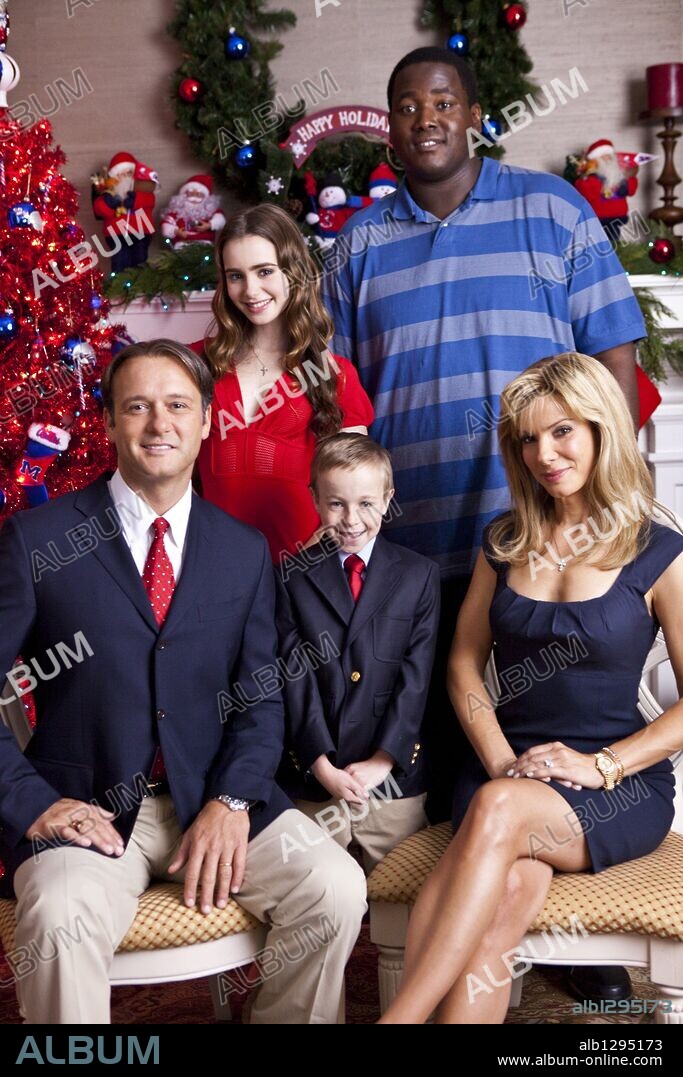 JAE HEAD, LILY COLLINS, QUINTON AARON, SANDRA BULLOCK and TIM MCGRAW in THE BLIND SIDE, 2009, directed by JOHN LEE HANCOCK. Copyright ALCON ENTERTAIMENT / NELSON, RALPH.