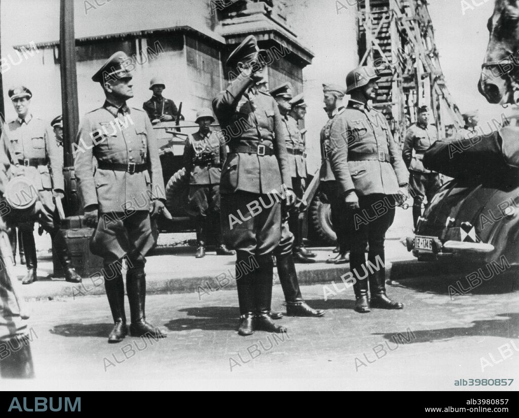 General von Bock saluting German troops parading past the Arc de Triomphe, Paris, on 14 June 1940, the day that the city fell to the Nazis.