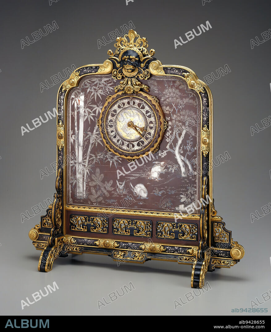 Clock, c. 1869, Emile-Auguste Reiber; Maker: Christofle, French, 1826-1893, 20 1/2 x 19 1/2 x 7 3/4 in. (52.07 x 49.53 x 19.69 cm)6 1/2 x 2 3/8 x 7/8 in. (16.51 x 6.03 x 2.22 cm) (pendulum), Silver, bronze, copper, gilt, pigment, France, 19th century, This magnificent clock illustrates some of the earliest Japanese influences on European decorative arts following the reopening of Japan to the Western world in 1854. The clock combines European and Asian iinfluences. Its overall form is derived from an 18th-century Chinese table screen; the face and whimsical beast above it is inspired by Tibetan mandalas; and the silver inlay depicts scenes taken from Japanese paintings, lacquerware, and ceramics.