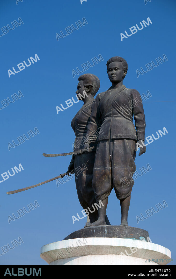 Rama I's Chakri dynasty met its first great test in the massive Burmese invasion of 1785. King Bodawpaya of Burma (1781-1819) sent more than 100,000 troops in five armies against Siam. The Burmese forces that invaded southern Thailand enjoyed initial success but were halted at Thalang, in central Phuket, by the bravery of the local defenders. Two sisters - Chan, or 'Date Plum', and Muk, or 'Pearl', the widow and sister-in-law of the late governor, organised the resistance by ordering the local women to cut their hair short and dress as men. When the Burmese commander saw the defences, he was fooled into thinking Thalang had many more soldiers than was actually the case! The court in Bangkok, on learning of the two sister's brave action, distinguished them with royal titles. Miss Chan was named Thepkasatri, or 'Angelic Queen', and Miss Muk became Si Sunthorn, or 'Goddess of Beauty'. Today they are still seen as local folk heroes and spiritual guardians of the island. They stand together on the Heroine's Monument at Thepkasatri Road, brandishing long swords towards any future invaders of the island.