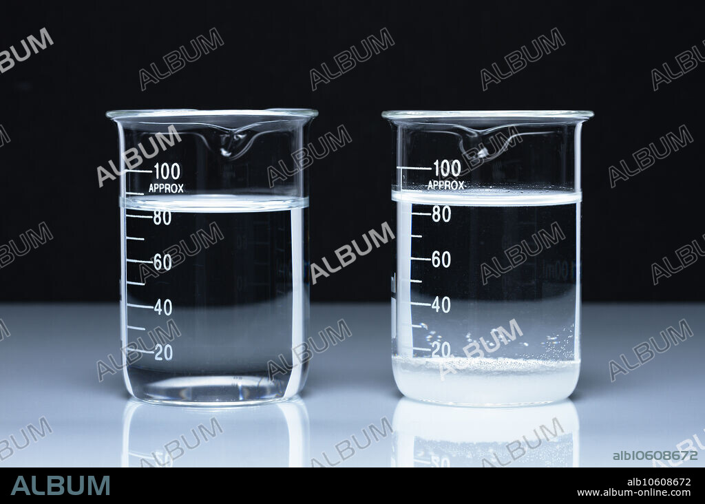 Concentrated and saturated solutions. Two beakers with concentrated (left) and saturated (right) solutions of table salt (sodium chloride, NaCl) in water (H2O). The saturated solution has some solid sodium chloride at the bottom that cannot be dissolved.