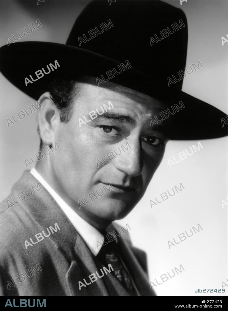 JOHN WAYNE in WAR OF THE WILDCATS, 1943 (IN OLD OKLAHOMA), directed by ALBERT S. ROGELL. Copyright REPUBLIC PICTURES.