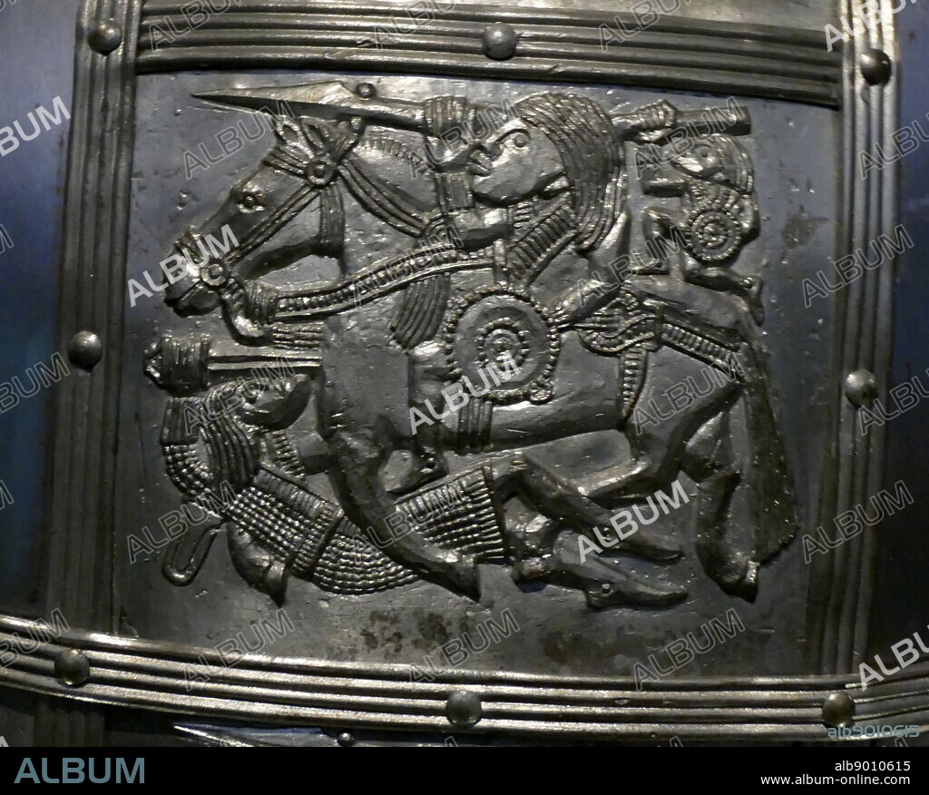 reconstruction of the Sutton Hoo helmet, a decorated Anglo-Saxon helmet discovered during the 1939 excavation of the Sutton Hoo ship-burial. Buried around 625 AD. it is believed to have been the helmet of King Raedwald; for whom its elaborate decoration may have given it a secondary function almost akin to a crown.