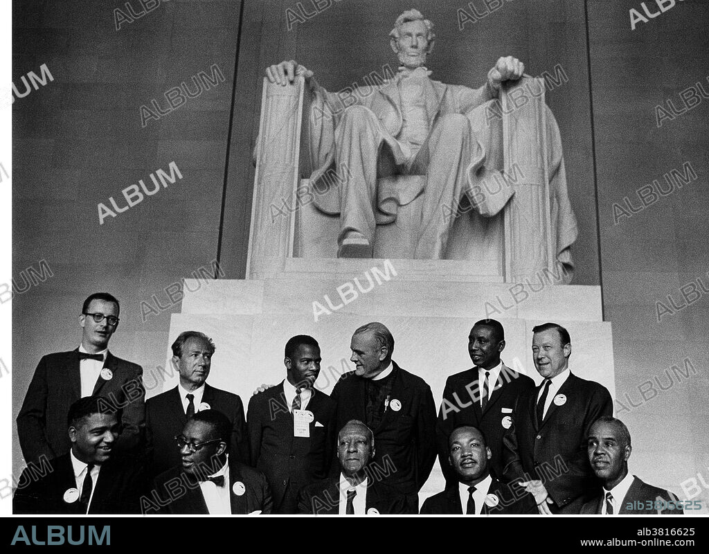 Entitled: "Civil Rights leaders pose in the Lincoln Memorial during the March on Washington for Jobs and Freedom. Pictured are, standing from left, director of the National Catholic Conference for Interracial Justice Matthew Ahmann, Rabbi Joachim Prinz, Student Nonviolent Coordinating Committee (SNCC) leader John Lewis, Protestant minister Eugene Carson Blake, Congress of Racial Equality (CORE) leader Floyd McKissick, and labor union leader Walter Reuther; sitting from left, National Urban League executive director Whitney Young, unidentified, labor union leader A Philip Randolph, Dr. Reverend Martin Luther King Jr., and National Association for the Advancement of Colored People (NAACP) leader Roy Wilkins." The March on Washington for Jobs and Freedom was one of the largest political rallies for human rights in United States history and called for civil and economic rights for African-Americans. The march is credited with helping to pass the Civil Rights Act (1964) and preceded the Selma Voting Rights Movement which led to the passage of the Voting Rights Act (1965).