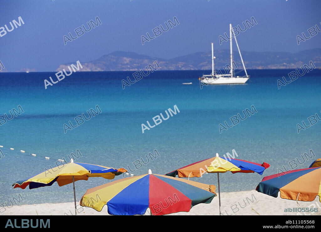 Colourful umbrellas on Playa de ses Illetes beach, Formentera, Balearic Islands, Spain, Mediterranean, Europe.