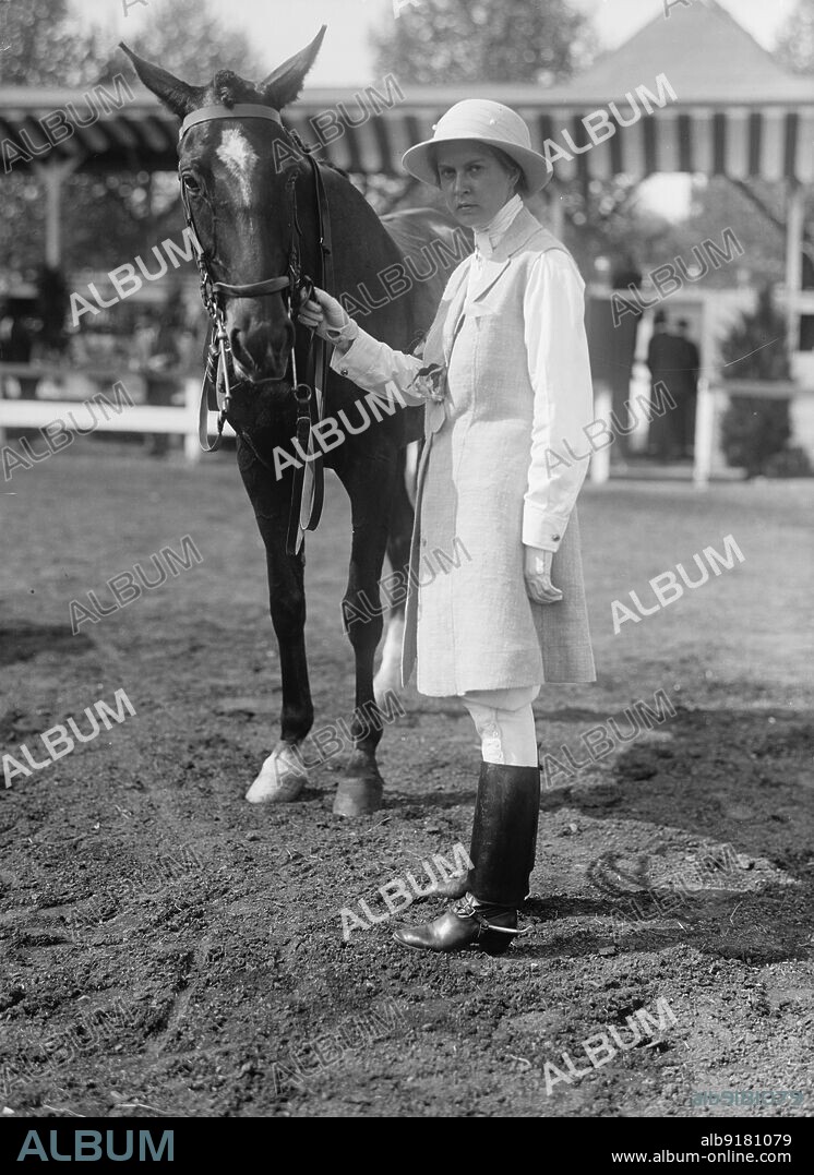 HARRIS & EWING. Scriven, Miss Catherine, at Horse Show, 1915 or 1916.