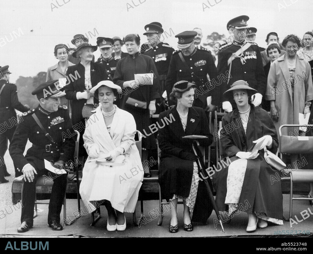 Duchess of Kent at Sandhurst -- At the Royal Militery Academy, Sandhurst, The Duchess of Kent (second from left) and Princess Alexandra (right) watch the march past during the Sovereign's Parade. August 05, 1954. (Photo by United Press Photo).