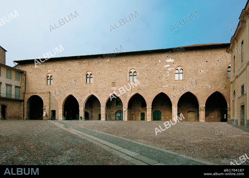 Portico in Piazza Cittadella Bergamo, by Unknown Artist, 1355 post, 14th Century,. Italy, Lombardy, Bergamo, Piazza Cittadella. View facade portico pointed arch flooring walls stone bricks pilasters two light windows Bergamo.