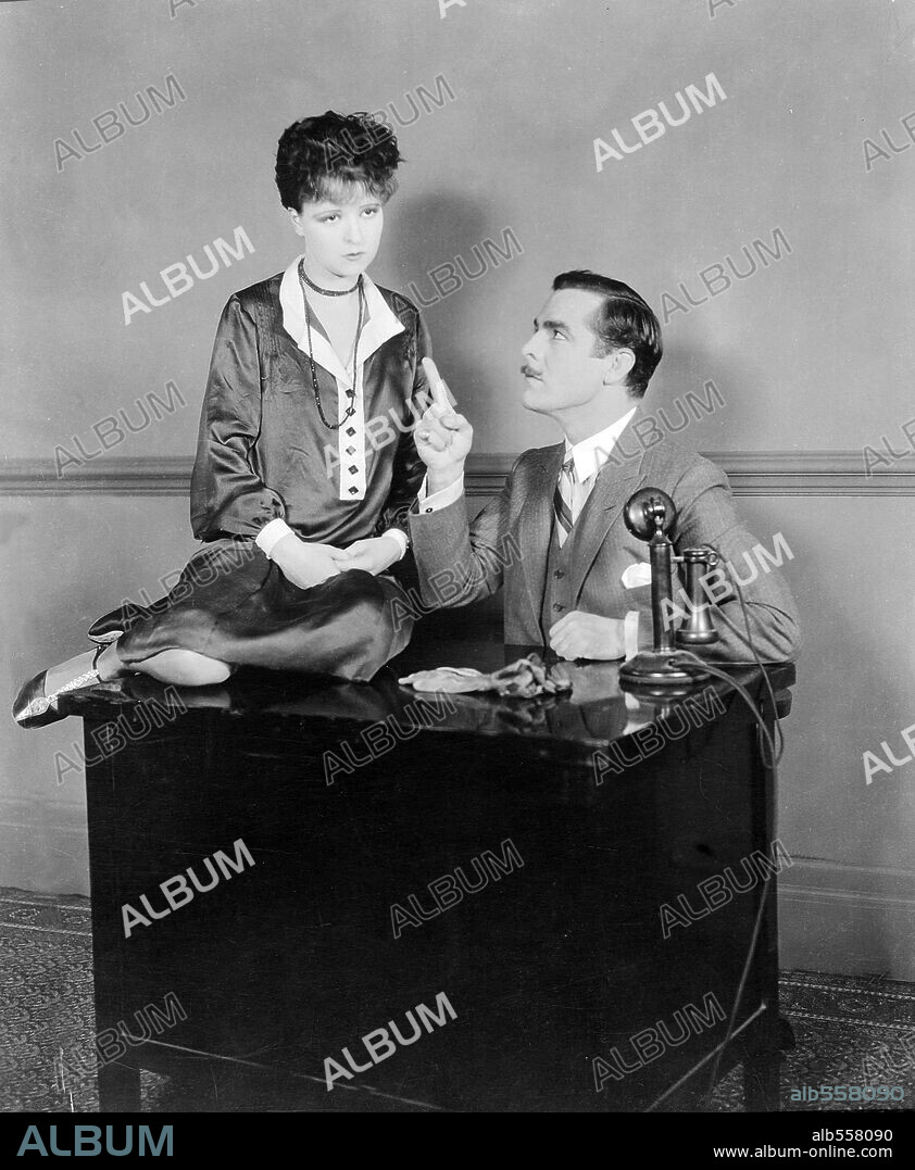 ANTONIO MORENO and CLARA BOW in IT, 1927, directed by CLARENCE G. BADGER. Copyright PARAMOUNT PICTURES.
