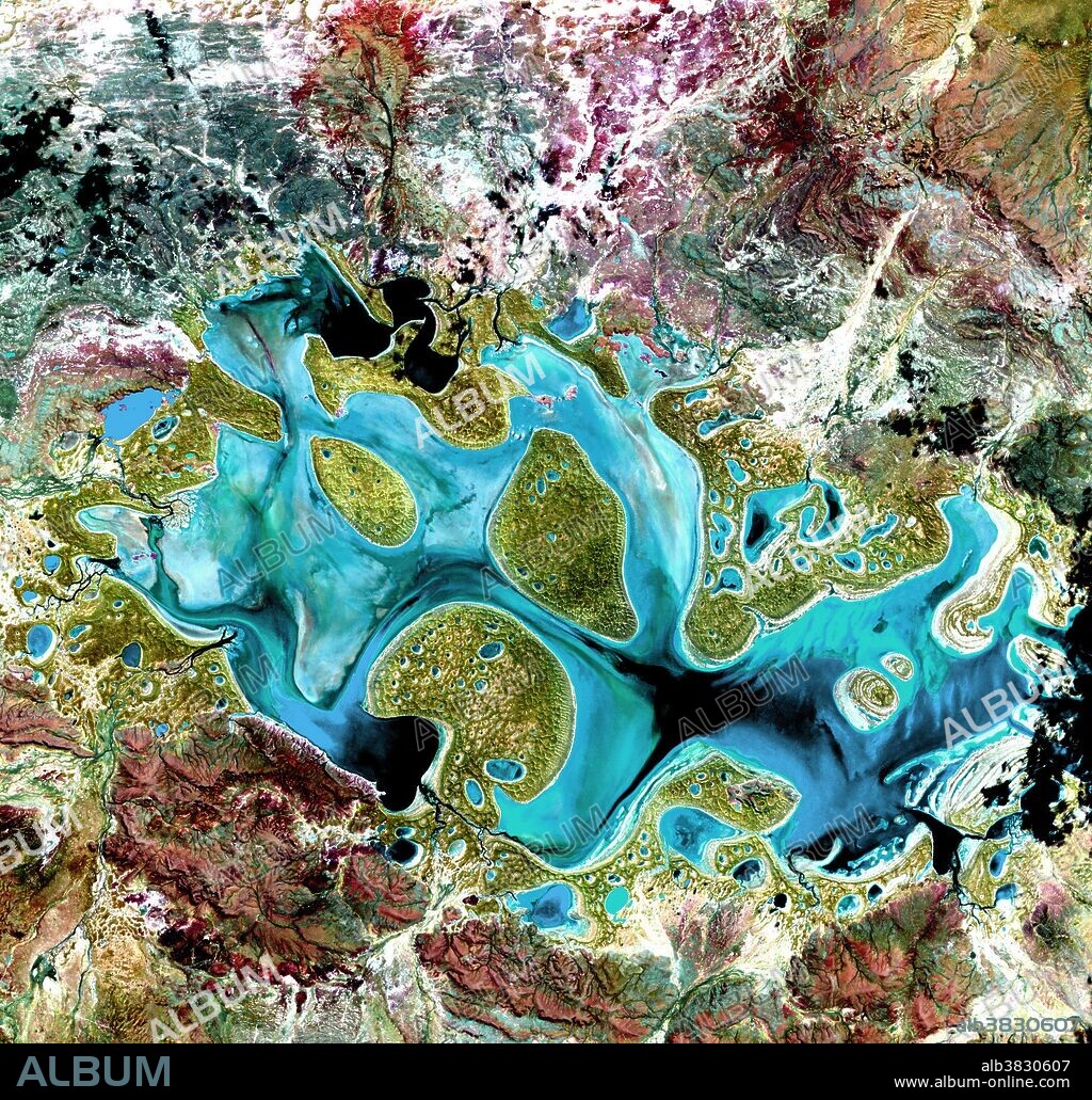 Ephemeral Lake Carnegie, fills with water only during periods of significant rainfall. In dry years, it is reduced to a muddy marsh. This image was acquired by Landsat 7's Enhanced Thematic Mapper plus sensor on May 19, 1999. This is a false-color composite image made using shortwave infrared, infrared and red wavelengths.