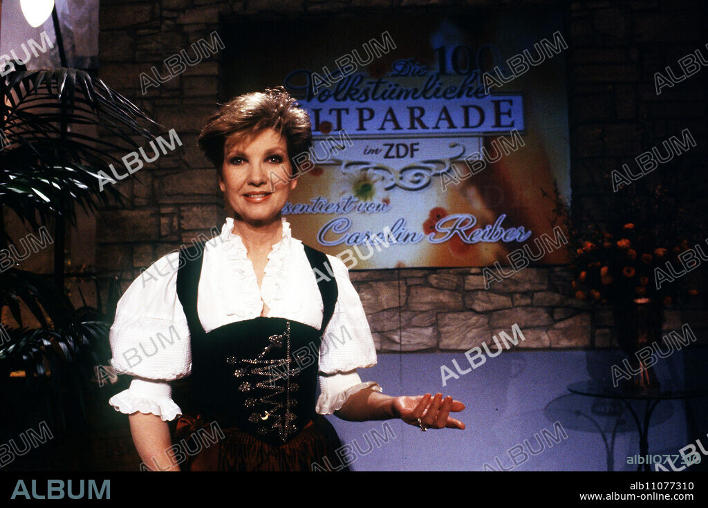 CAROLIN REIBER, presenter of the music show DIE VOLKSTÜMLICHE HITPARADE IM ZDF, Germany 1999.