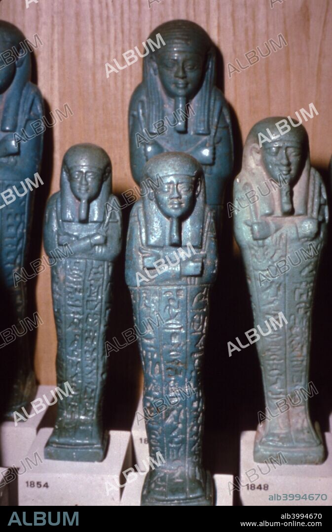 Egyptian Faience Shabti-Figures from a Tomb. The ushabti (also called shabti or shawabti) was a funerary figurine used in Ancient Egypt. Ushabtis were placed in tombs among the grave goods and were intended to act as servants or minions for the deceased, should they be called upon to do manual labor in the afterlife.
