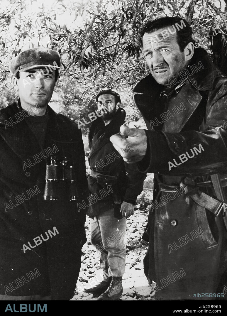 DAVID NIVEN and GREGORY PECK in THE GUNS OF NAVARONE, 1961, directed by J. LEE THOMPSON. Copyright COLUMBIA PICTURES.