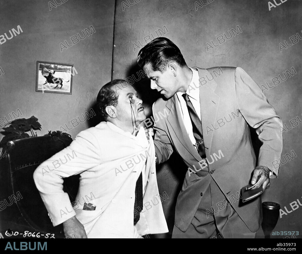 GLENN FORD in AFFAIR IN TRINIDAD, 1952, directed by VINCENT SHERMAN. Copyright COLUMBIA PICTURES.