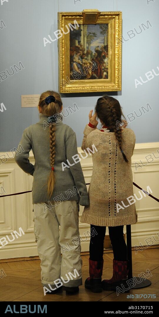 Girls looking at a painting. The State Hermitage Museum. Saint Petersburg. Russia.