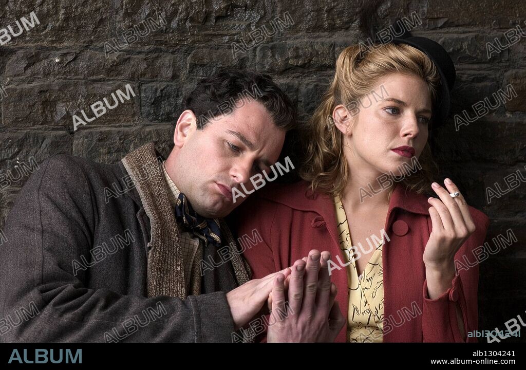 MATTHEW RHYS and SIENNA MILLER in THE EDGE OF LOVE, 2008, directed by JOHN MAYBURY. Copyright BBC FILMS/CAPITOL FILMS/PRESCIENCE FILM FUND/RAINY DAY.