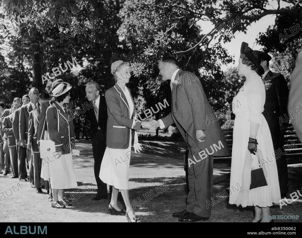 Empire Games Garden Party at Auckland, New Zealand:The Governor-General of New Zealand, Sir Bernard Freyberg V.C., greeting Canadian games competitors at Government House on February 2nd. Lady Freyberg is on the right. February 07, 1950.
