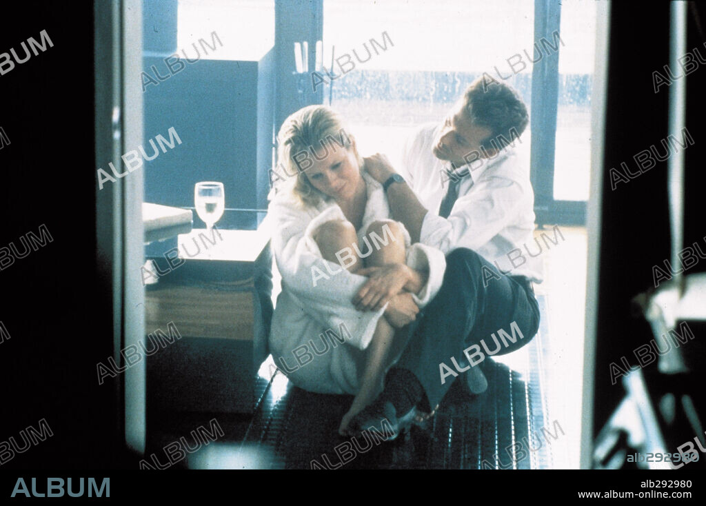 KIM BASINGER and MICKEY ROURKE in NINE 1/2 WEEKS, 1986, directed by ADRIAN LYNE. Copyright M.G.M/UNITED ARTIST.