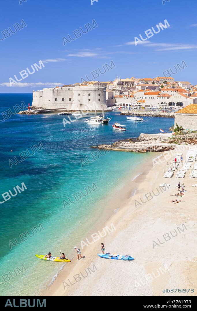 Banje beach, Old Port and Dubrovnik Old Town, Dubrovnik, Dalmatian Coast, Croatia, Europe.