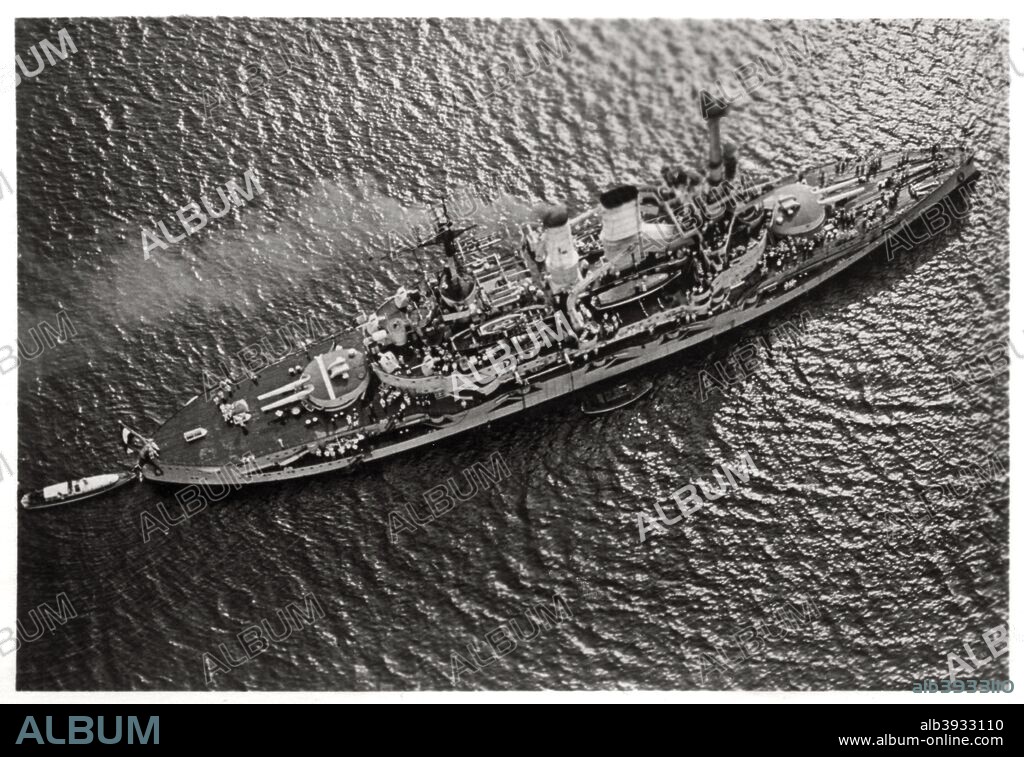 Aerial view of the German battleship SMS 'Schlesien', from a Zeppelin, c1931 (1933). The 'Schlesien' ('Silesia') was a pre-dreadnought battleship launched in 1906. She saw service in the German Navy in both World Wars before being scuttled by her crew at Swinemunde in 1945. A photograph from Zeppelin-Weltfahrten, Vom ersten Luftschiff 1899 bis zu den Fahrten des LZ127 Graf Zeppelin 1932, Dresden, 1933.