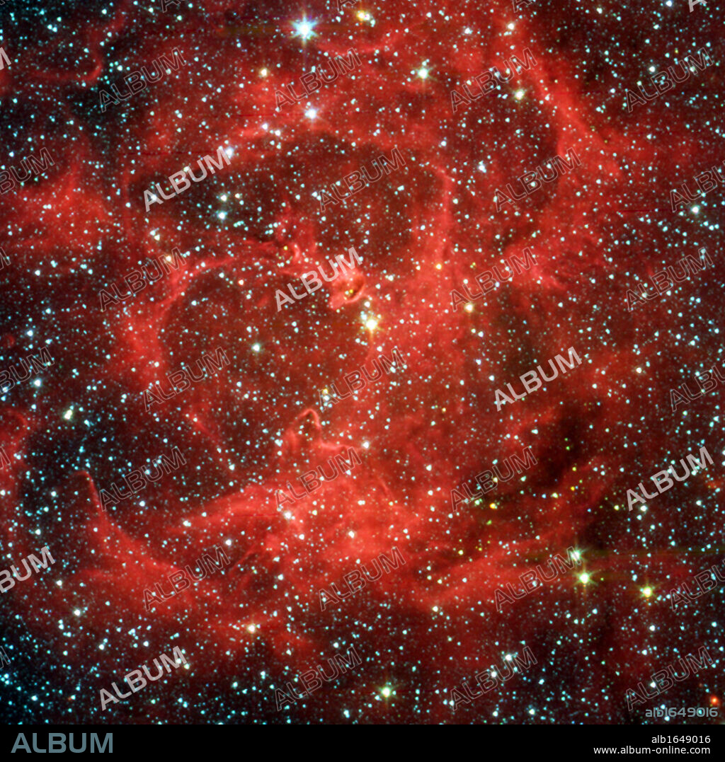 Spitzer Space Telescope comparison views in visible light and infrared of the glowing Trifid Nebula, a giant star-forming cloud of gas and dust located 5,400 light-years away in the Sagittarius. Credit NASA. Science Astronomy.