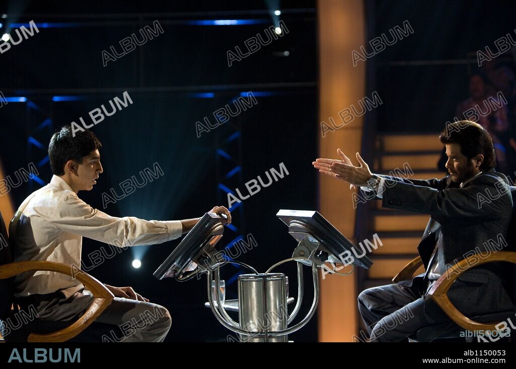 ANIL KAPOOR and DEV PATEL in SLUMDOG MILLIONAIRE, 2008, directed by DANNY BOYLE and LOVELEEN TANDAN. Copyright CELADOR FILMS/FILM4 / MOHAN, ISHIKA.