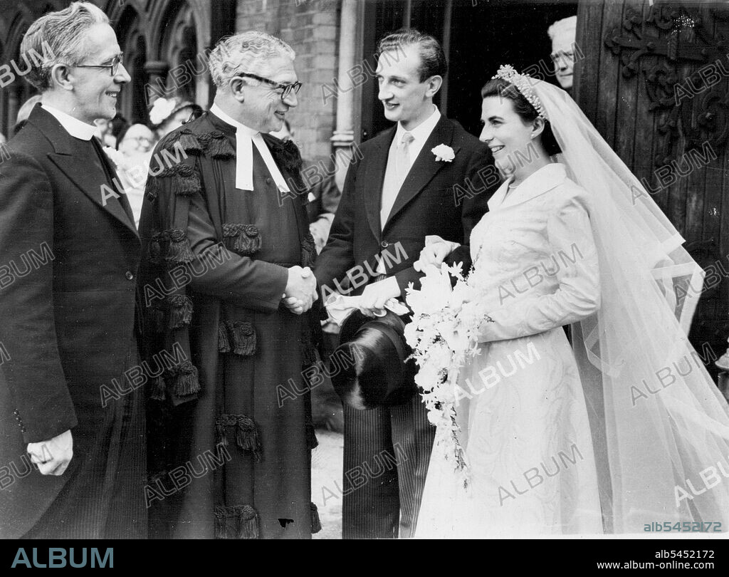Family AffairDoctor W.E. Sangster shakes hands with his bridegroom son after the ceremony, performed by the bride's father, the Rev. Charles Tudor (left).The father of the bride officiated at the wedding at Musewell Hill Mathodist Church to-day of Mr. Paul Sangster, a lay preacher in the Methodist Church, and 26-year-old Miss Mary Tudor, daughter of the Rev. Charles Tudor, secretary of the Methodist home mission department. He was helped by the father of the Westminster Central Hall and former president of the Methodist conference.The bridegroom is a school-teacher and 25 years of age. August 9, 1952.