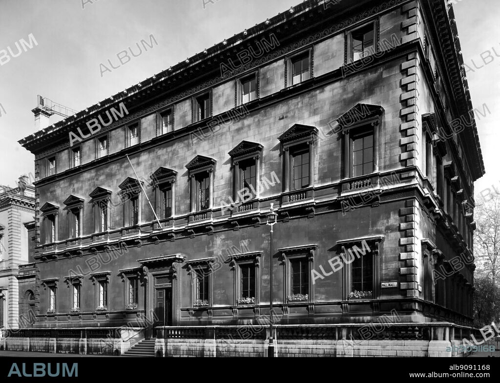 The Reform Club. Pall Mall. London. REFORM CLUB, on the south side of Pall Mall, between the Travellers' Club and the Canton Club, was founded by the Liberal members of the two Houses of Parliament, about the time the Reform Bill was canvassed and carried, 1830- 32. The Club consists of 1000 members, exclusive of members of either House of Parliament Entrance fee, 25 guineas; annual subscription for the first five years of election, 101. l0s., subsequently, 81. 8s. The house was built from the designs of Charles Barry, R. A. The exterior is greatly admired, though the windows, it is urged are too small. The interior, especially the large square hall covered with glass, occupying the centre of the building, is very imposing. The cooking establishment of the Club is under the superintendence of the celebrated M. Soyer, and in brilliancy of cuisine yields to none in Britain.