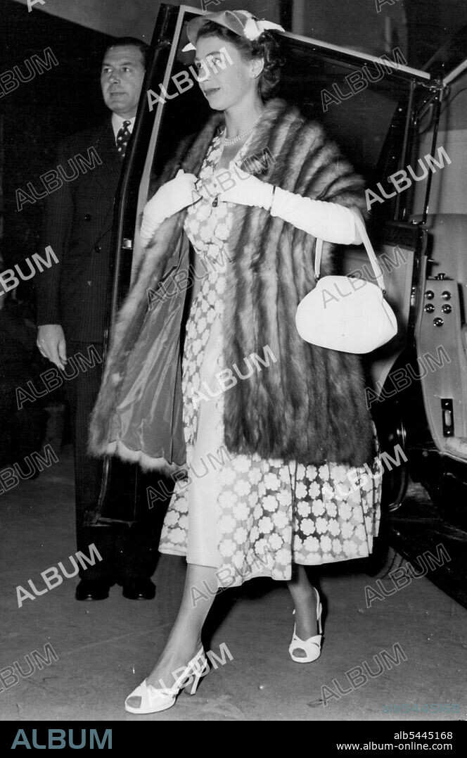 Queen Arrives For Royal Tournament Queen Elizabeth II is seen arriving at Earl's Court to-day for the Royal Military Tournament now in progress there. June 9, 1954.